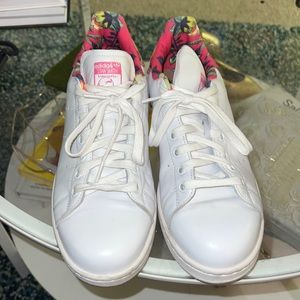Adidas Stan Smith shoes.